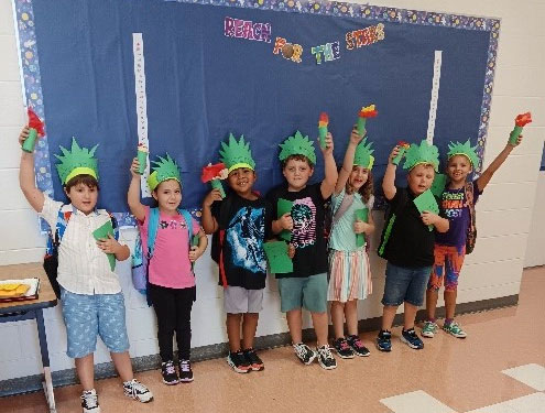 Everglades City School First Grade CLass Celebrating US Symbols