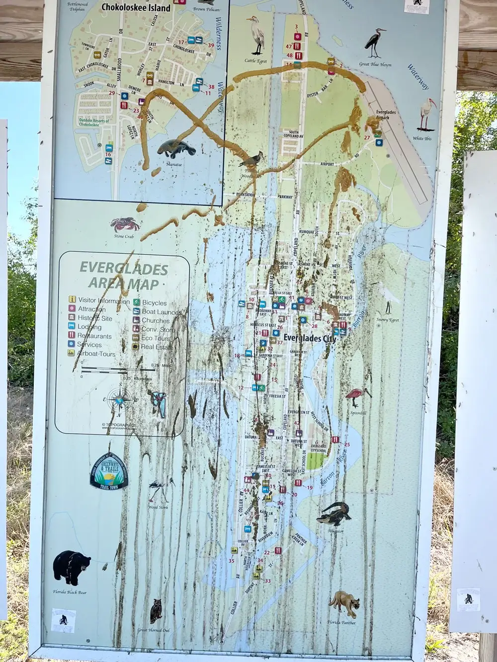 Everglades City Trail Town Sign Vandalized by Patty Huff from the Mullet Rapper on Visit Everglades City