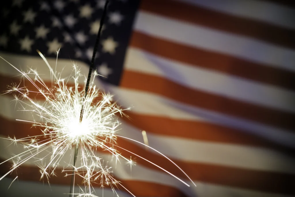 Flag with Sparkler Everglades City Independence Day Celebration